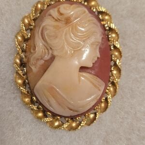 Elegant Gold and Cream Cameo Brooch